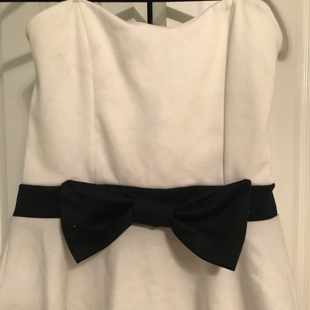 White and black peplum top